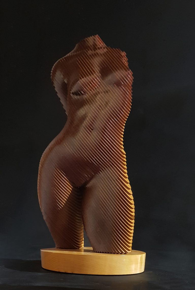 A wooden female torso in laminated MDF