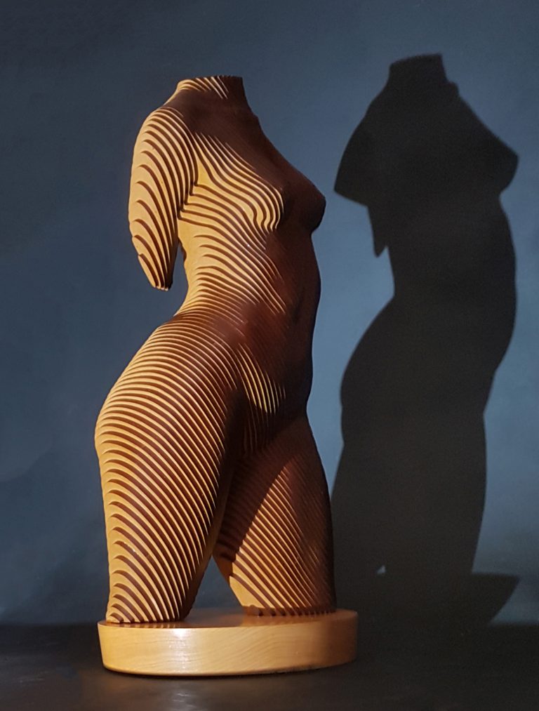 A wooden female torso in laminated MDF