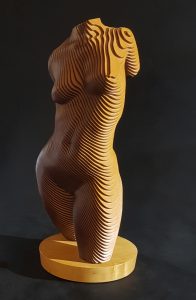 A wooden female torso in laminated MDF