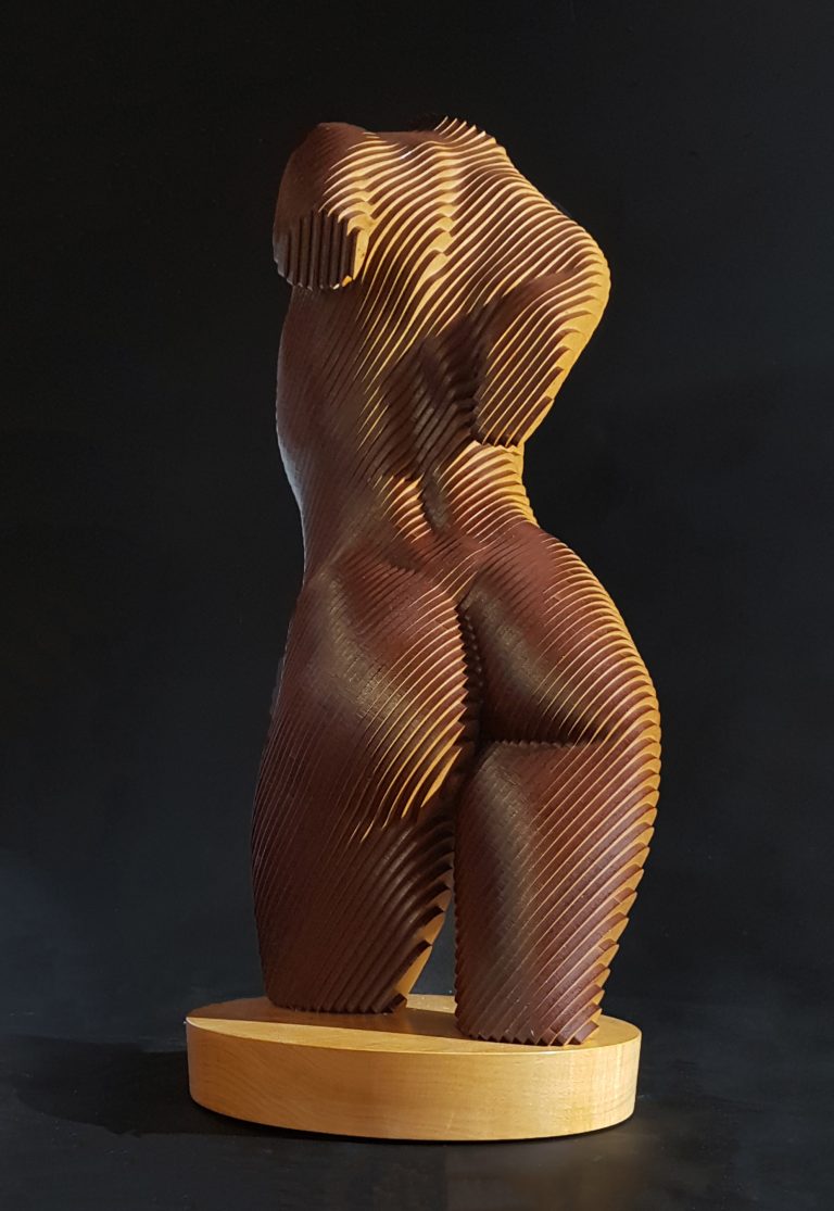 A wooden female torso in laminated MDF