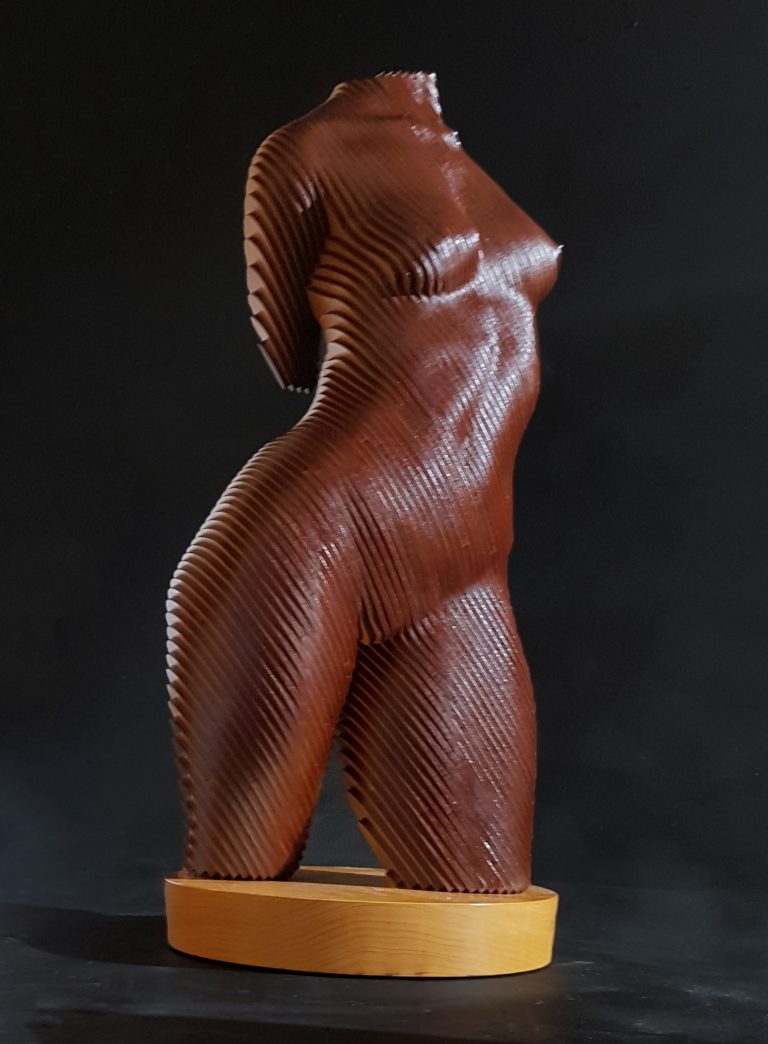 A wooden female torso in laminated MDF