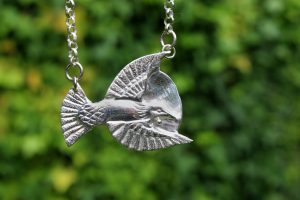 Tui pendant necklace